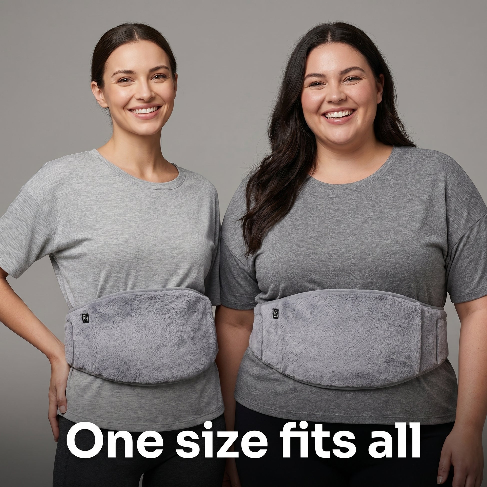 Two women of different body types both wearing the grey heated abdominal belt